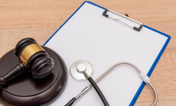 Home 11 medical law and justice concept with stethoscope a 2025 03 13 01 27 28 utc scaled 5e93318e